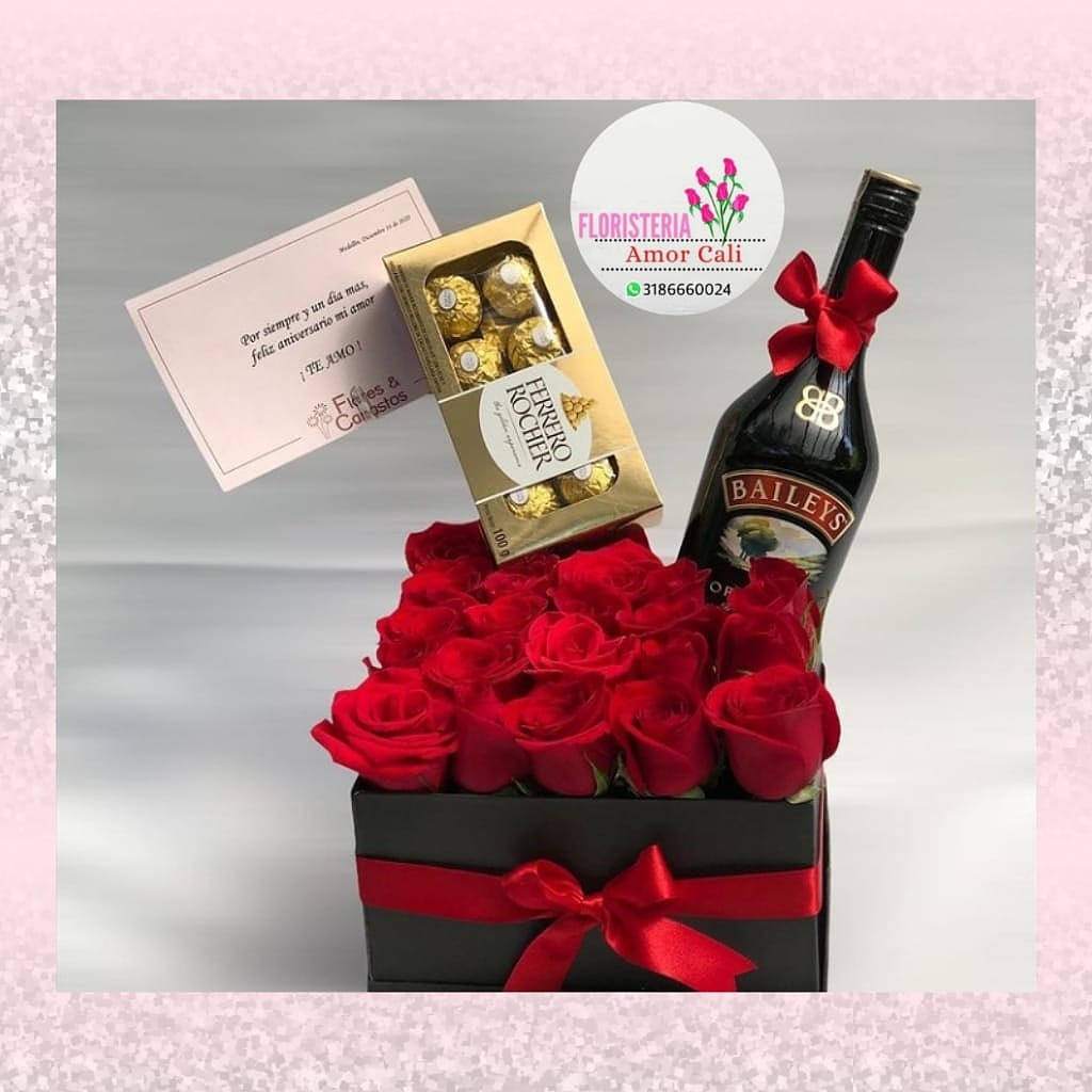 Arreglo floral rosas chocolate y crema de whisky -