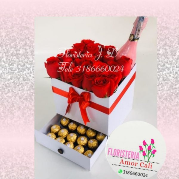 detalle floral ejecutivo con chocolates y chanpagne